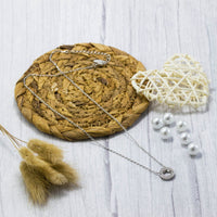 Silver Plated Circle of Life Necklace Created with Zircondia® Crystals