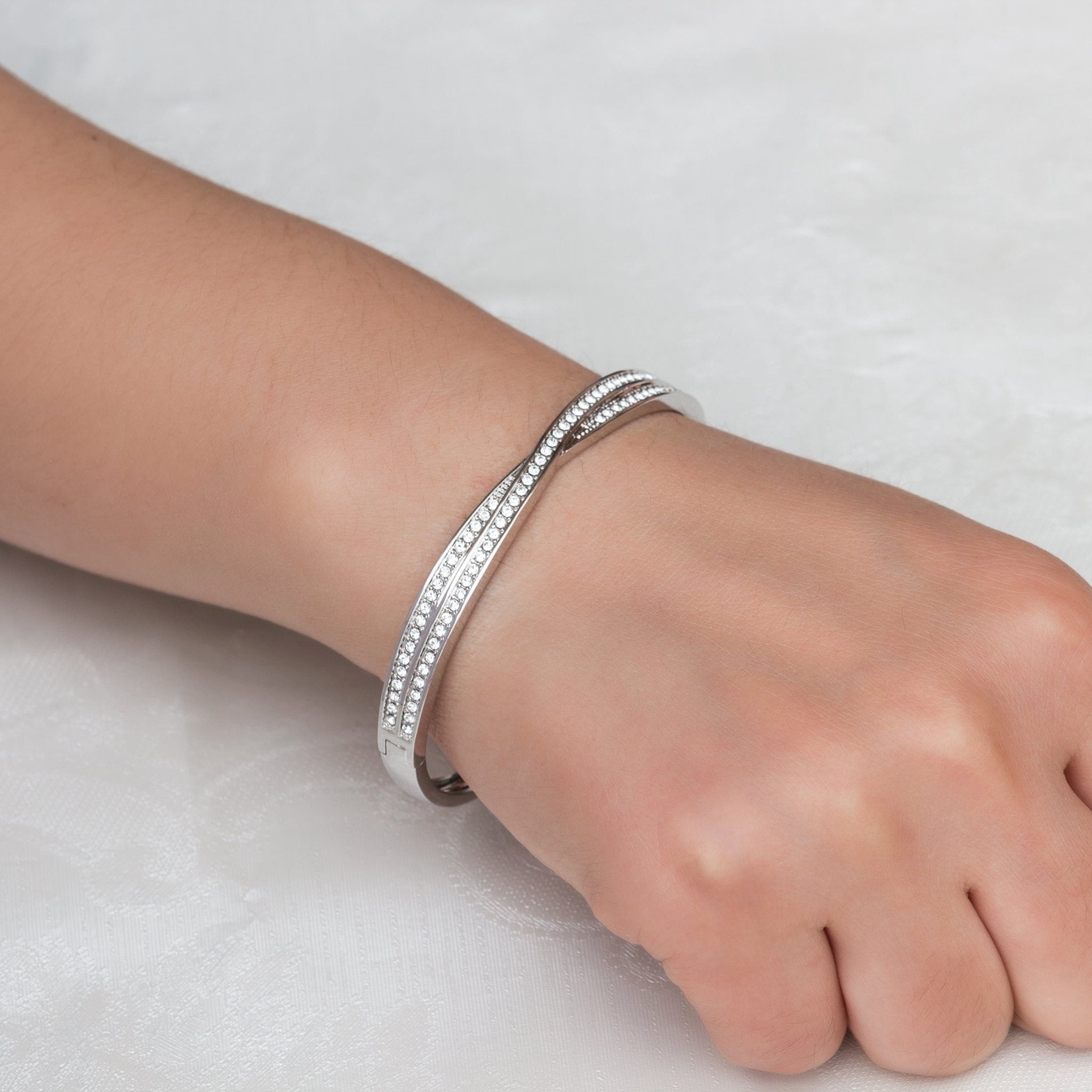 Silver Plated Crossover Bangle Created with Zircondia® Crystals (7 Inch)
