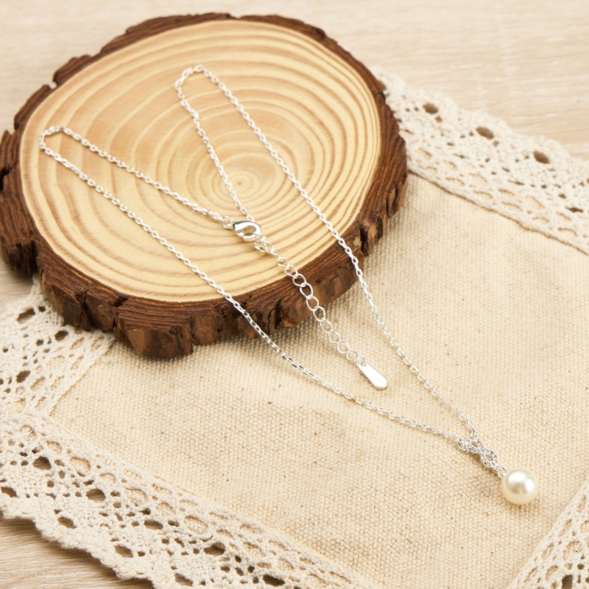 Silver Plated Infinity Pearl Drop Necklace Created with Zircondia® Crystals