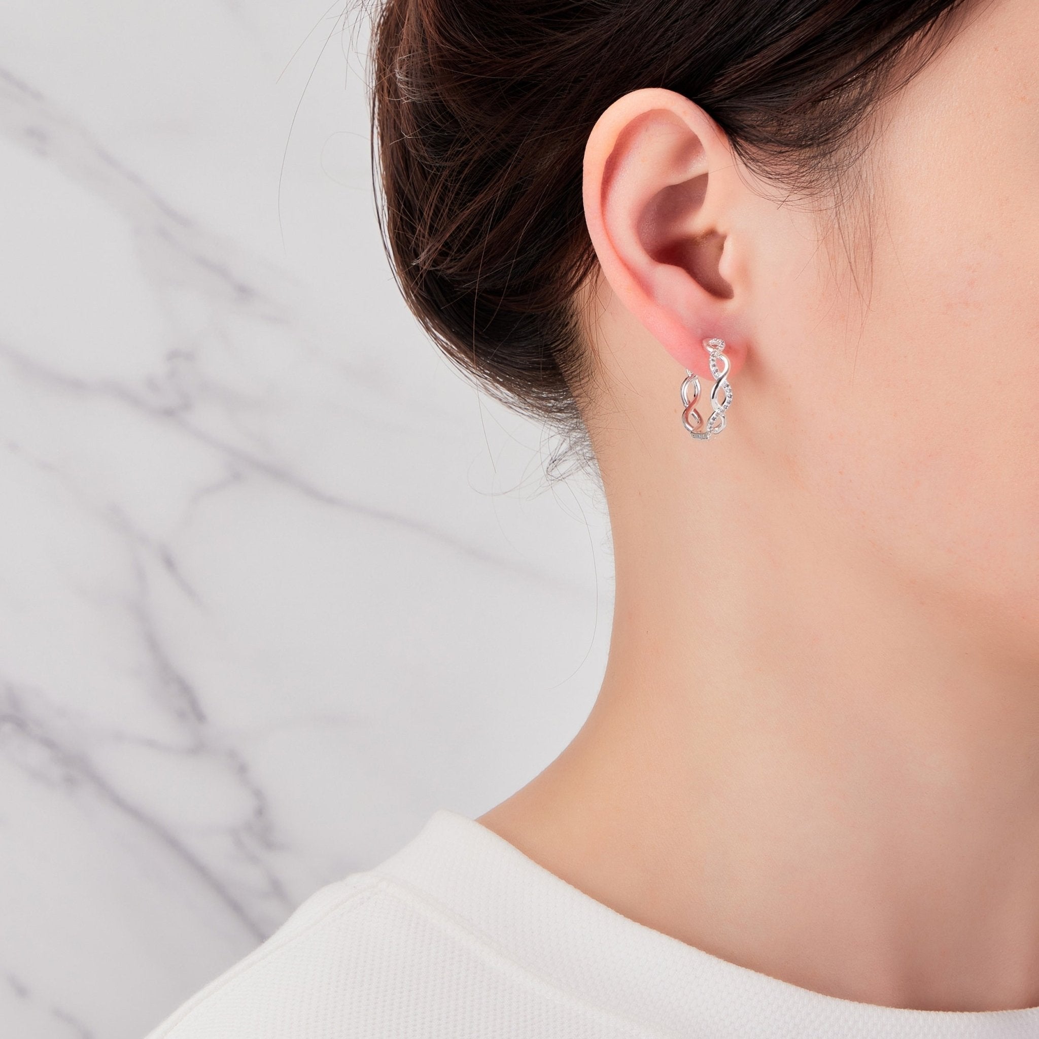Silver Plated Infinity Hoop Earrings Created with Zircondia® Crystals