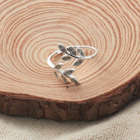 Silver Plated Leaf Ring Created with Zircondia® Crystals