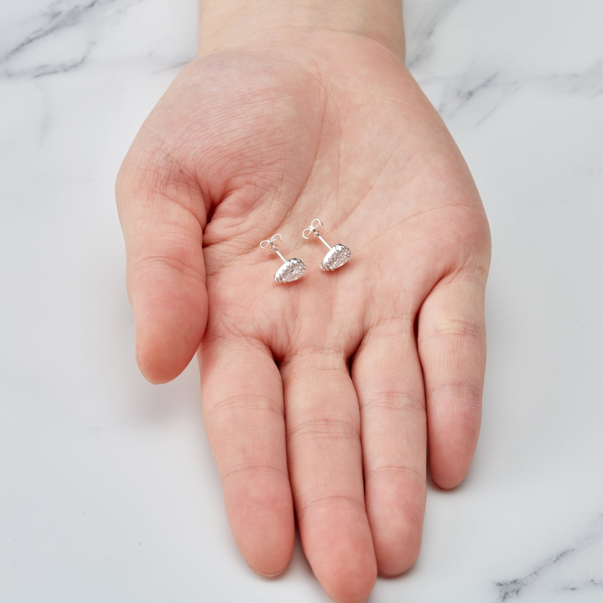 Silver Plated Pear Halo Earrings Created with Zircondia® Crystals