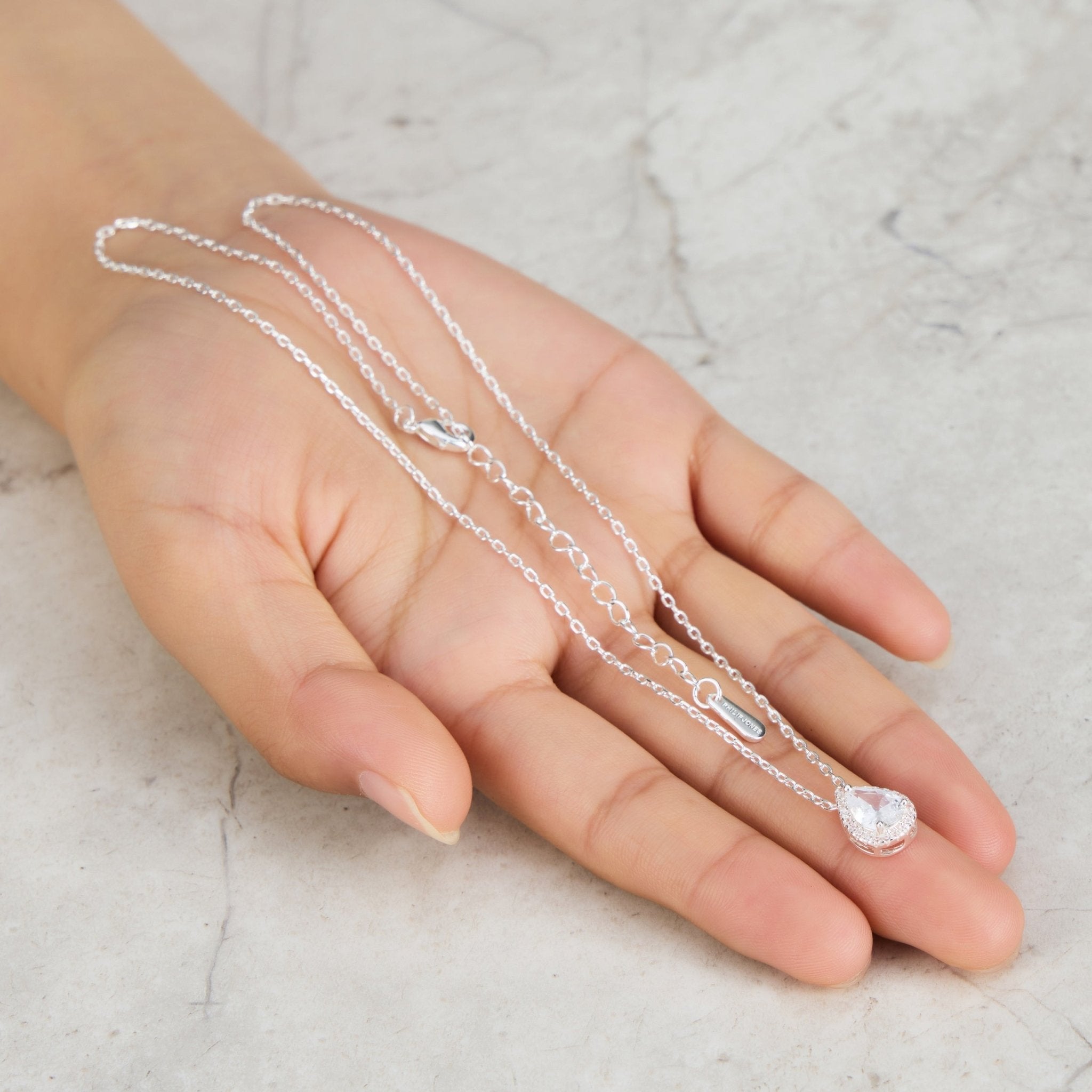 Silver Plated Pear Halo Necklace Created with Zircondia® Crystals