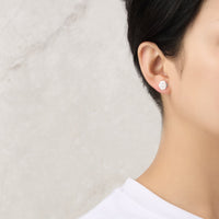 Silver Plated Rose Earrings Created with Zircondia® Crystals