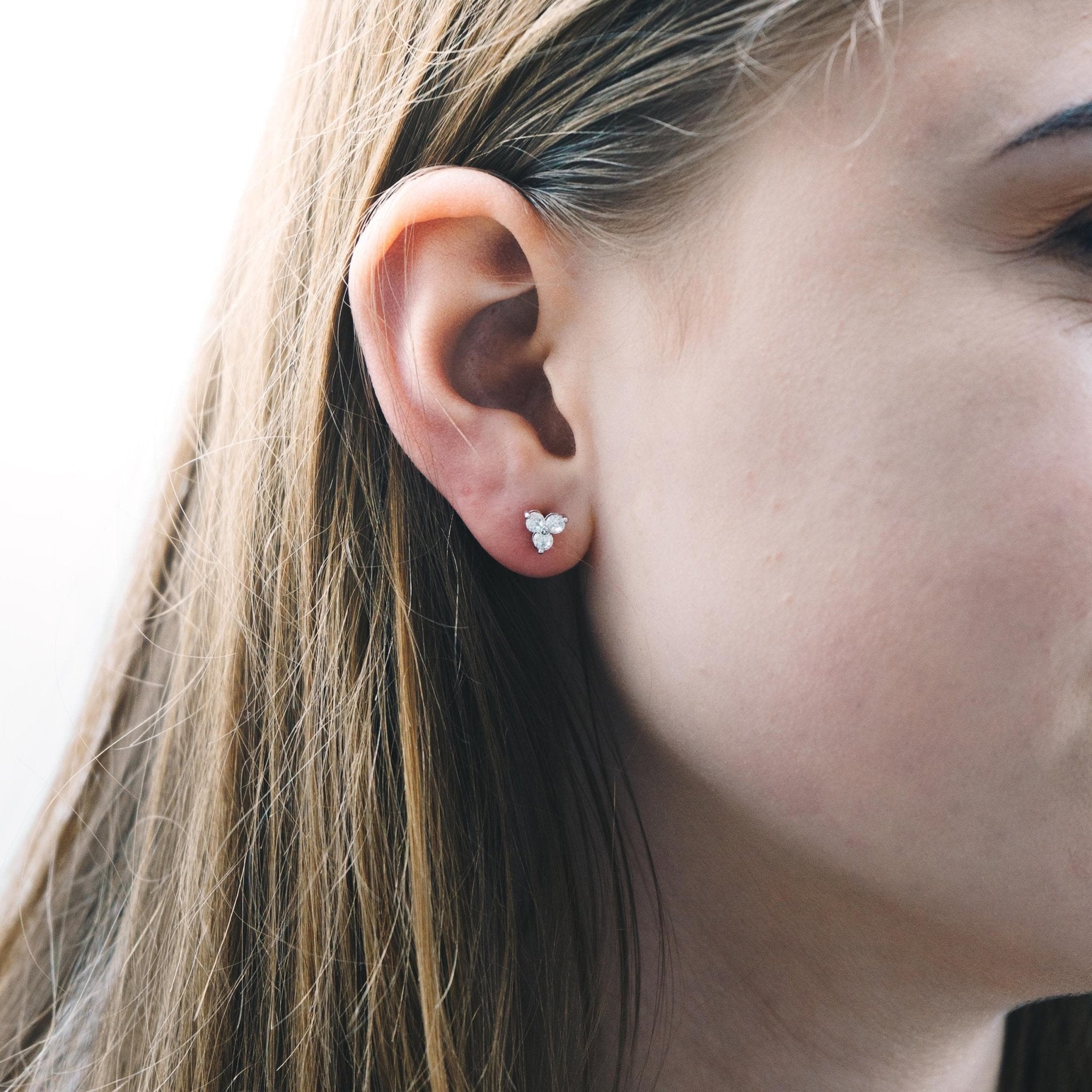 Silver Plated Three Stone Earrings Created with Zircondia® Crystals