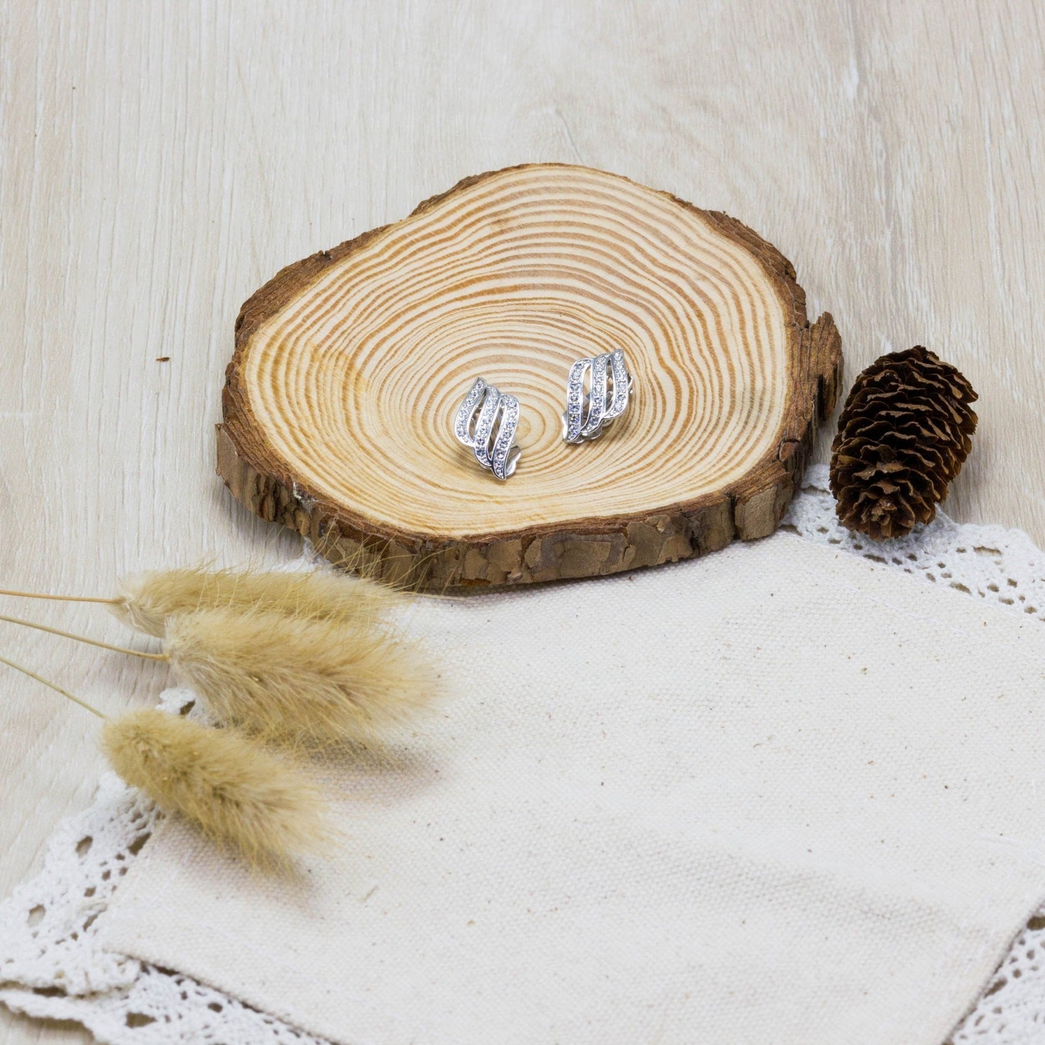 Silver Plated Triple Row Clip On Earrings Created with Zircondia® Crystals