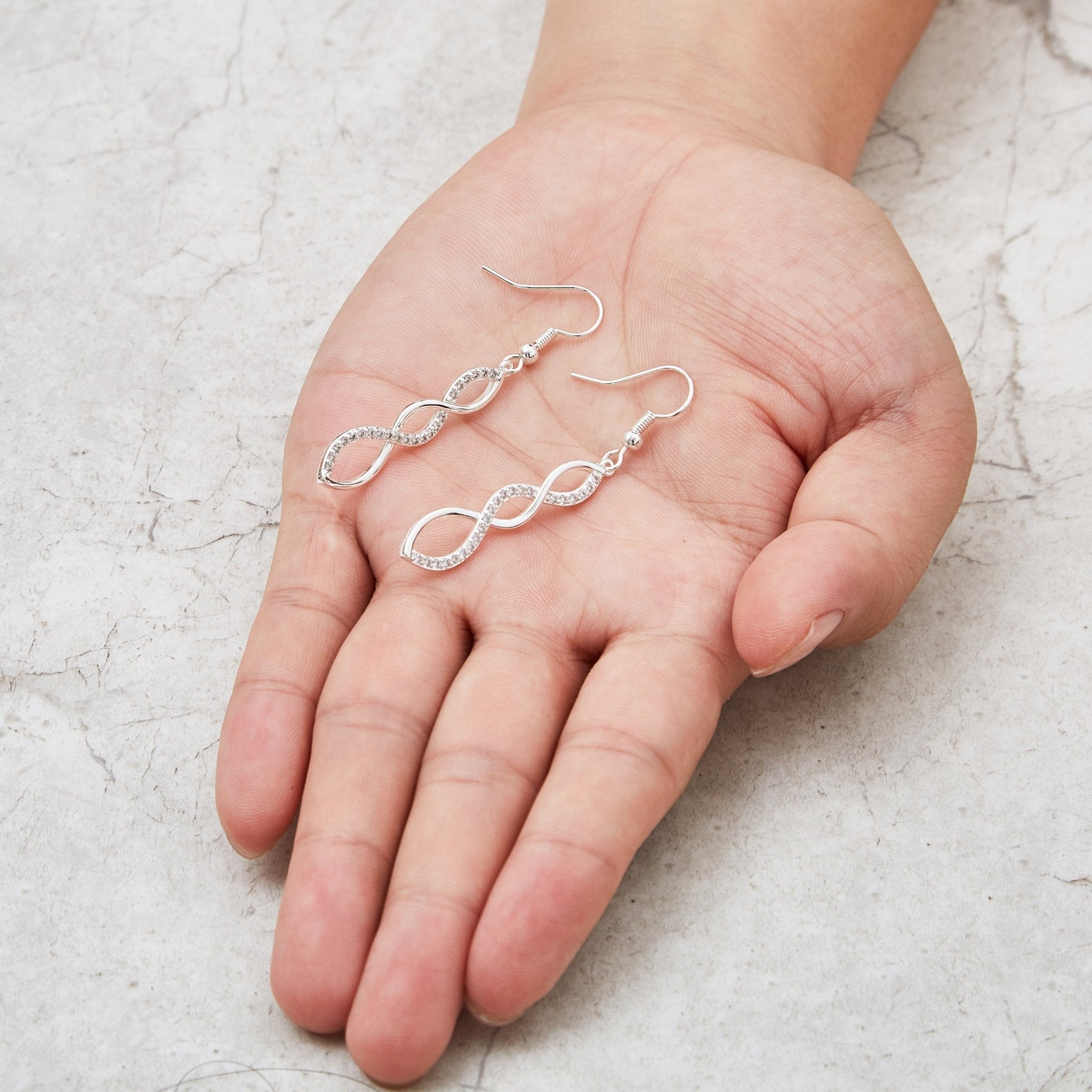 Silver Plated Twist Drop Earrings Created with Zircondia® Crystals