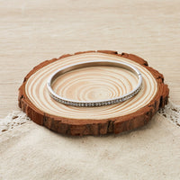 Stainless Steel Channel Set Bangle Created with Zircondia® Crystals (7 Inch)