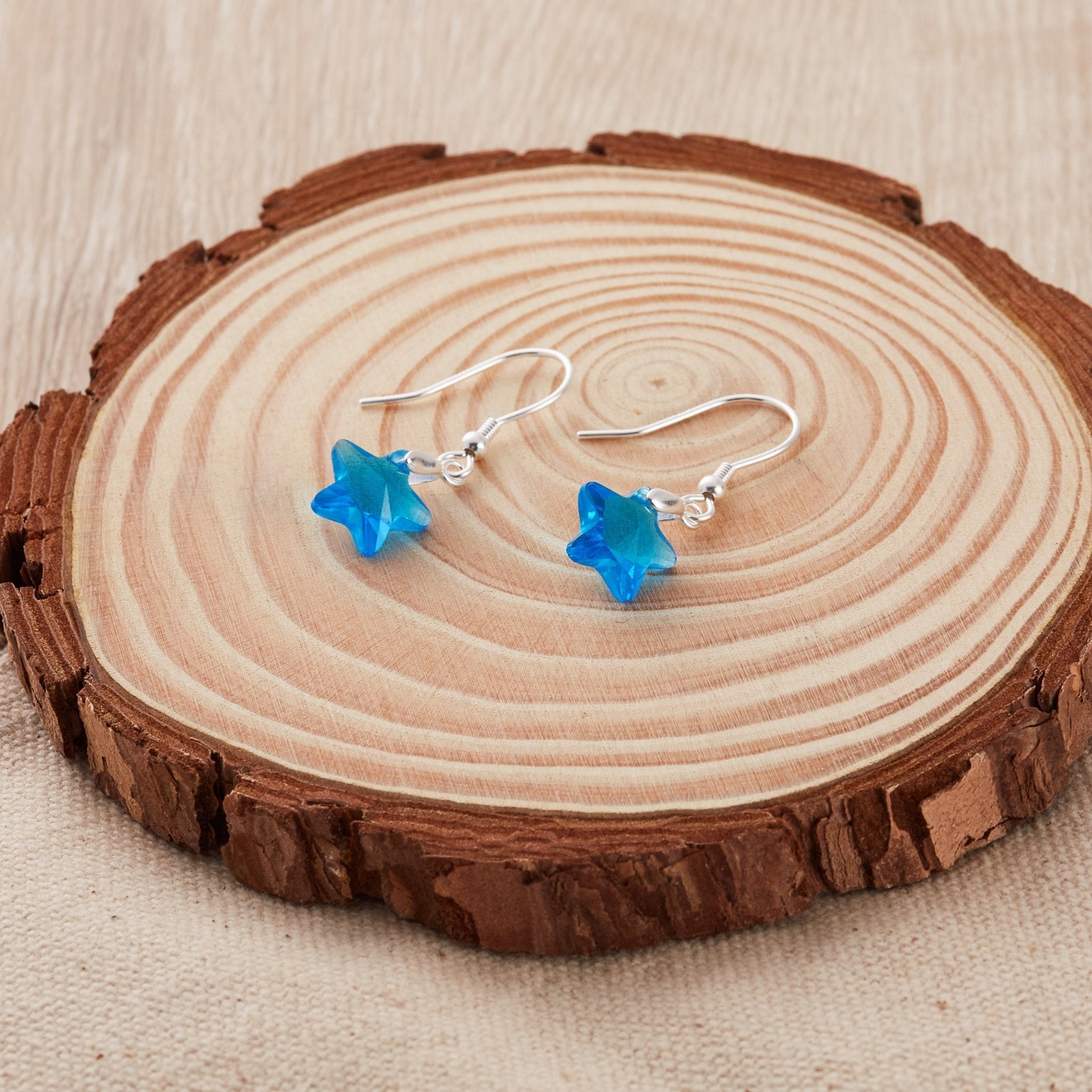 Sterling Silver Aquamarine Star Earrings Created with Zircondia® Crystals