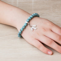 Synthetic Turquoise Gemstone Stretch Bracelet with Charm Created with Zircondia® Crystals