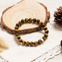 Tiger's Eye Gemstone Charm Stretch Bracelet with Charm Created with Zircondia® Crystals